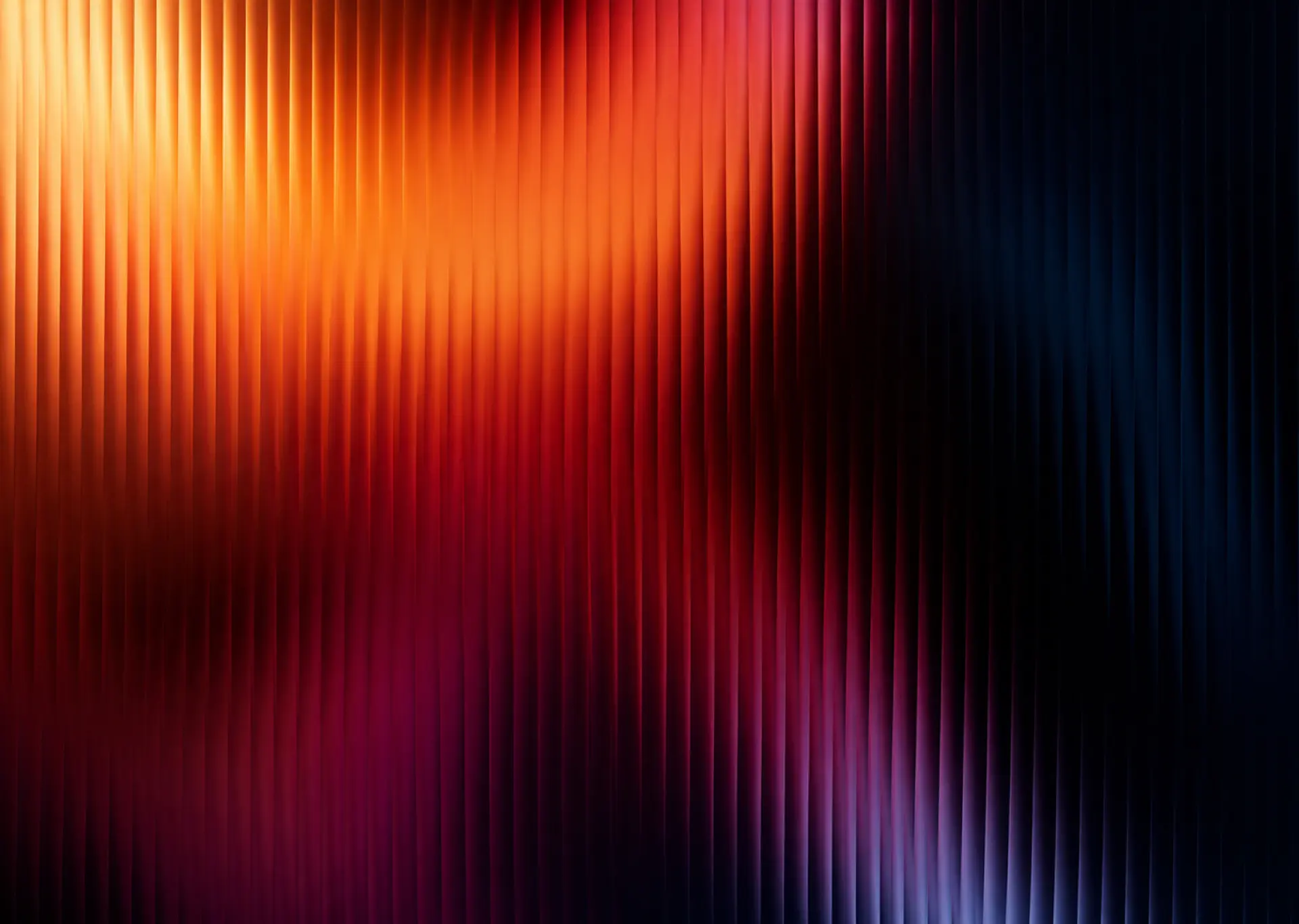 Warm amber-to-red gradient glow — the color spectrum of Sundown's blue light filter for Mac