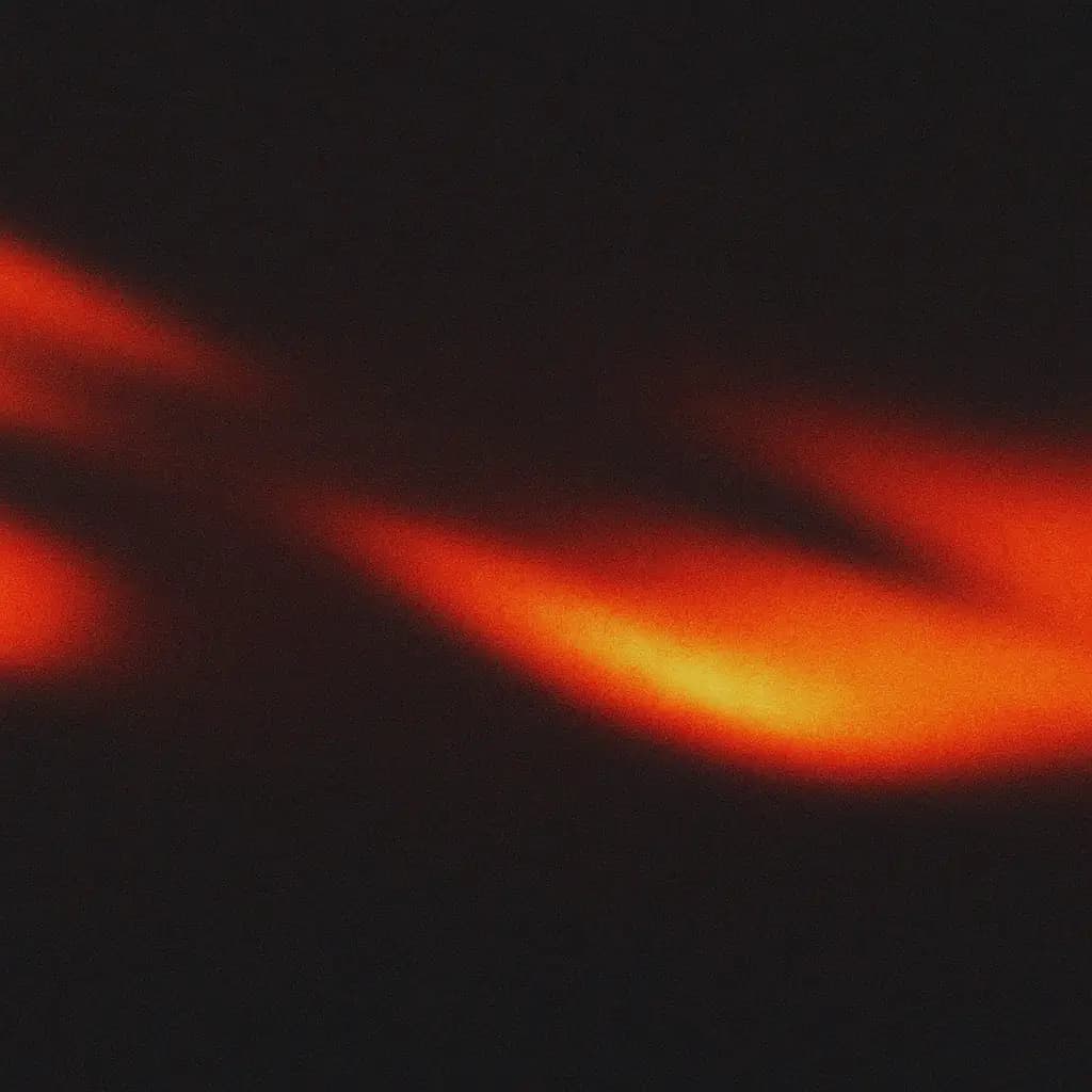 Warm amber-to-red gradient glow — the color spectrum of Sundown's blue light filter for Mac
