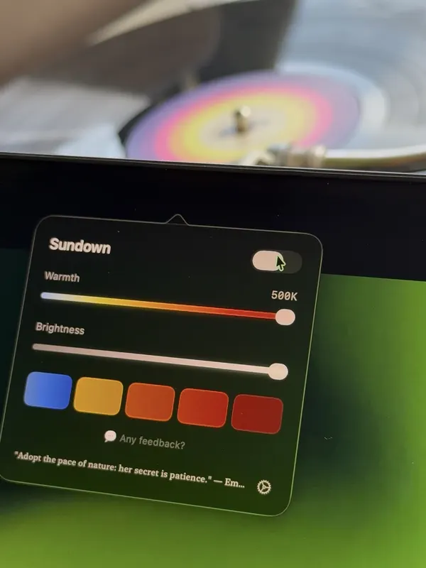 The Sundown menu at 500K on a Mac screen in front of a spinning record player